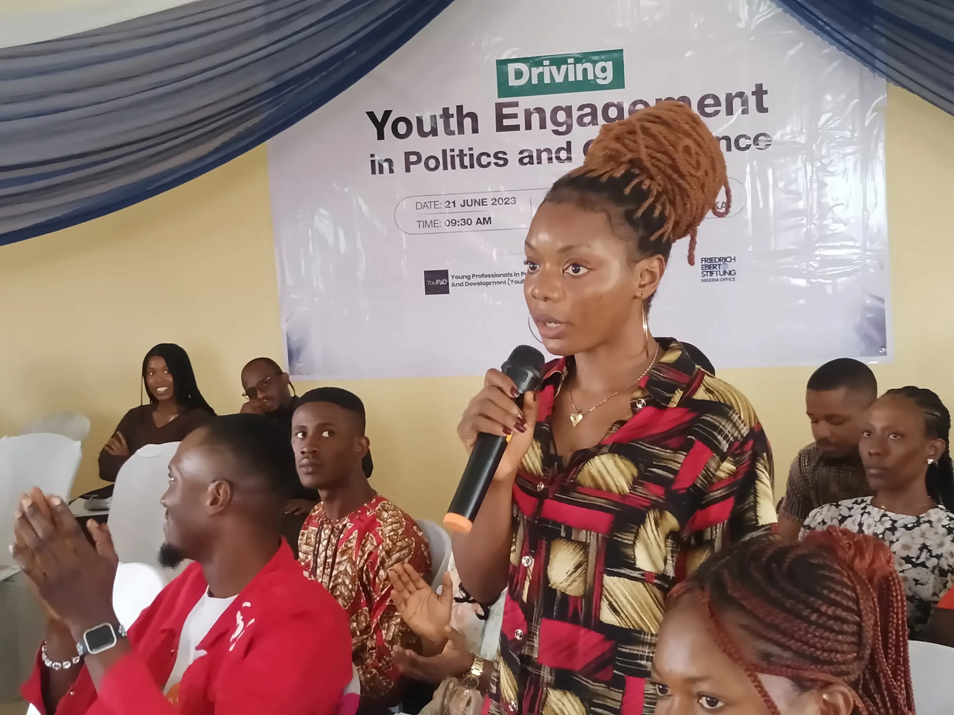 Youth engagement initiative speaker presenting at a conference